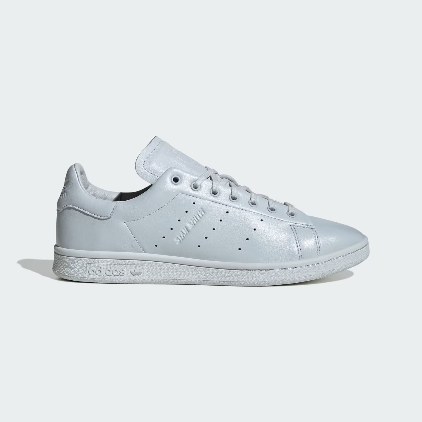 Light blue sneaker on a light gray background