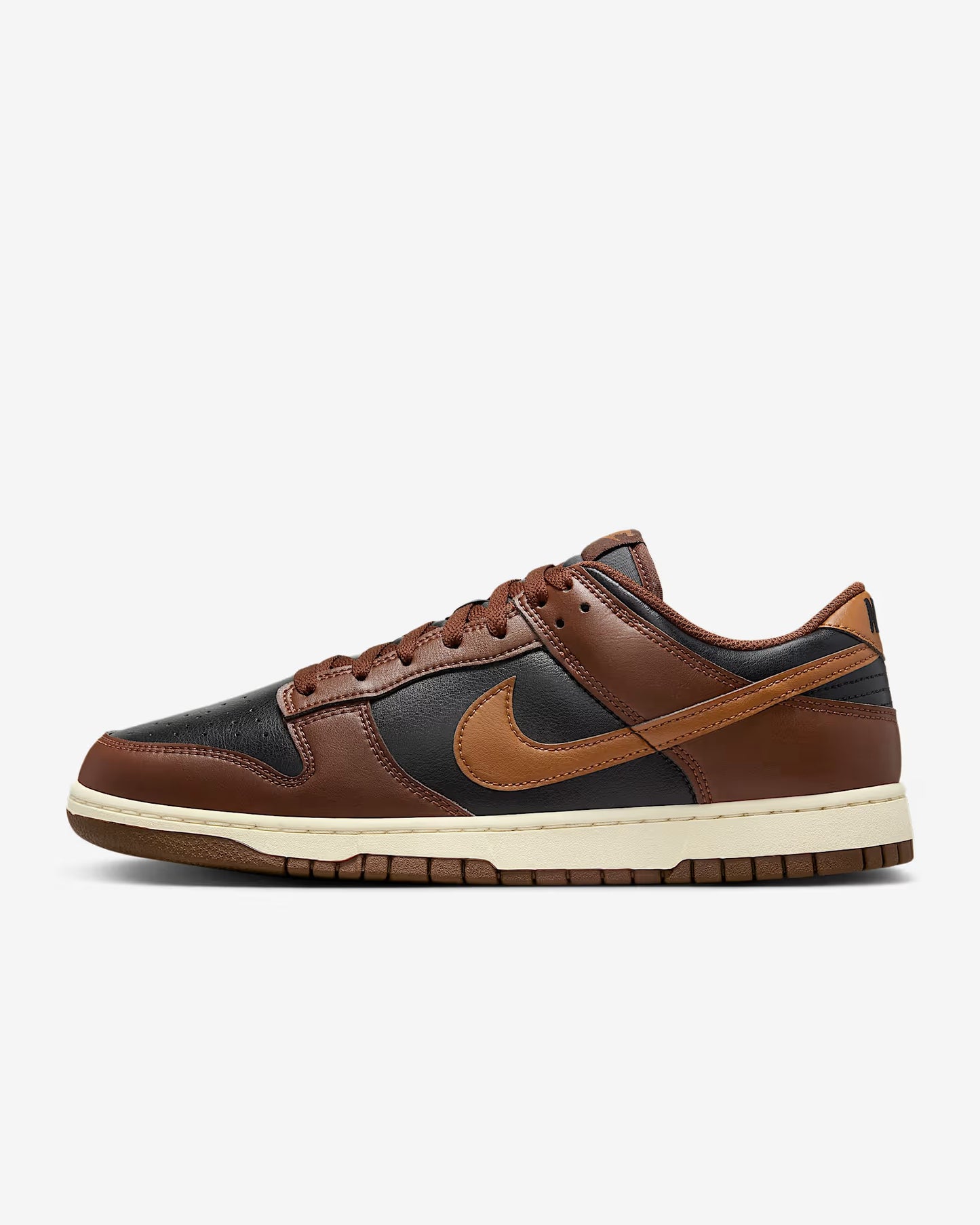 Brown and black sneaker with Nike logo on a white background