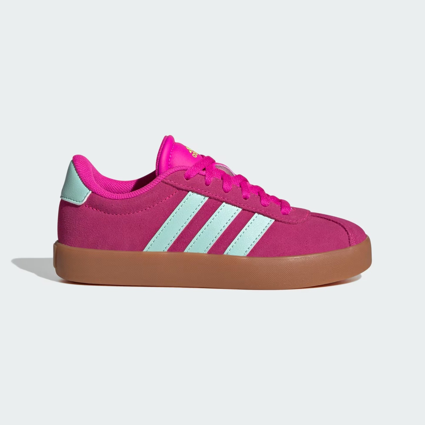 Pink sneaker with white stripes on a light gray background