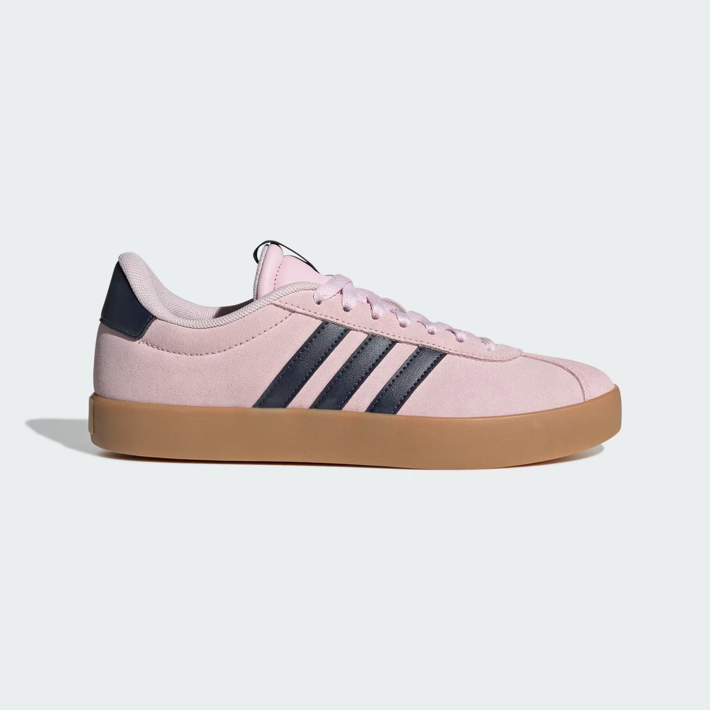 Pink sneaker with three black stripes on a light gray background