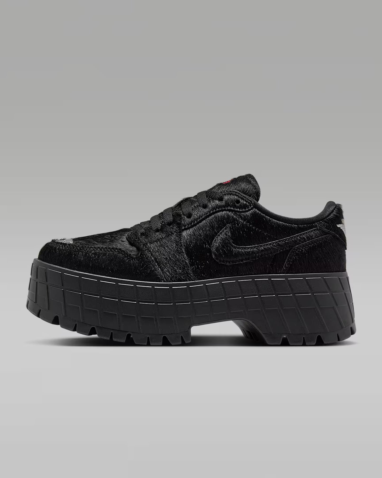 Woman's Zipped Air Jordan 1 Brooklyn Low