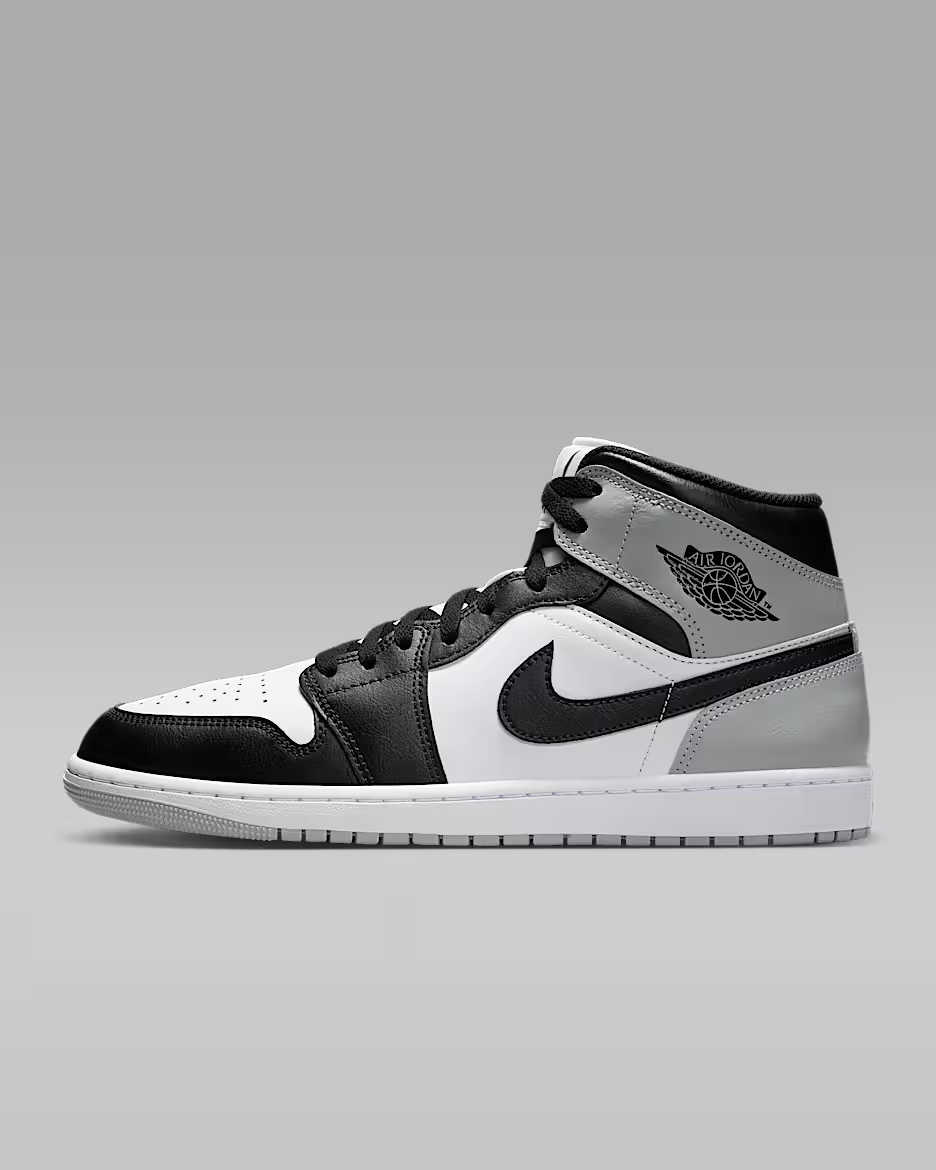 Black and gray sneaker on a gray background