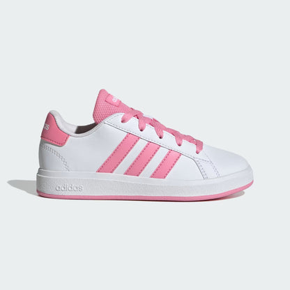 White and pink sneaker on a light gray background