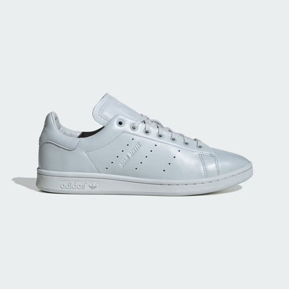 Light blue sneaker on a light gray background