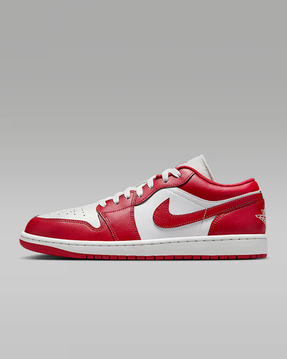 Red and white sneaker on a gray background