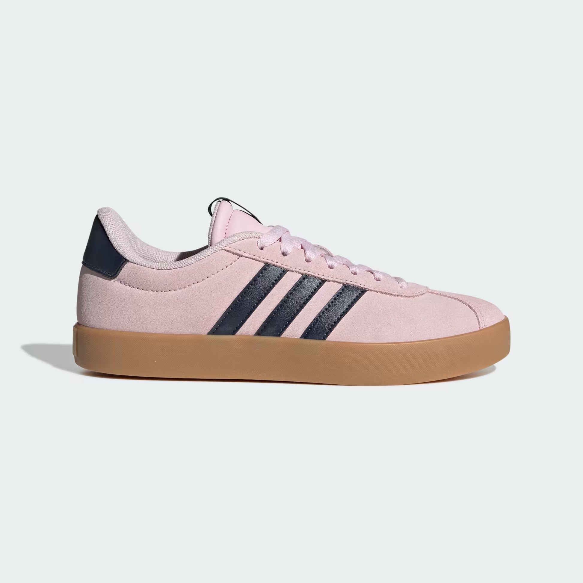 Pink sneaker with three black stripes on a light gray background
