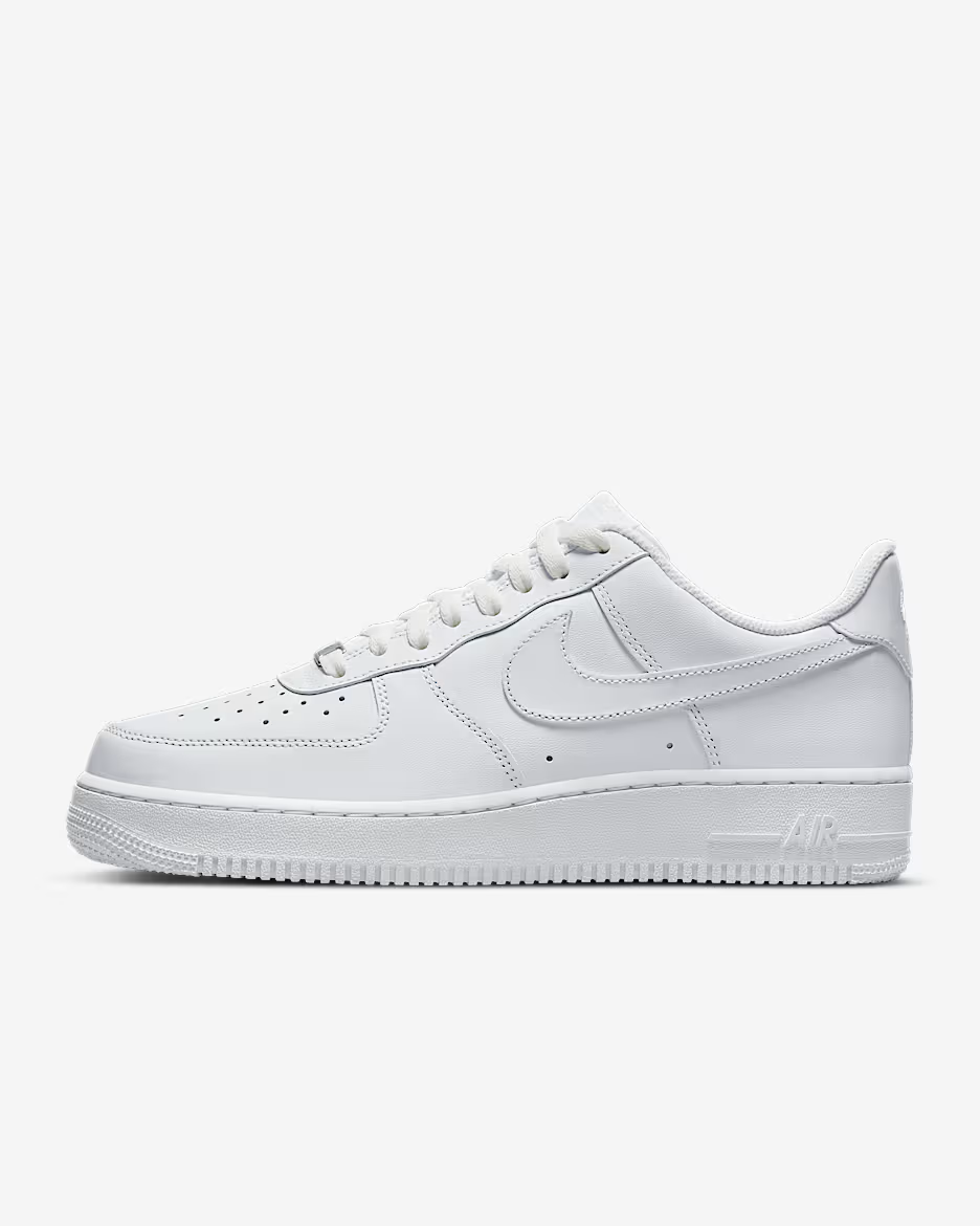 White Air Force sneakers on a light gray background